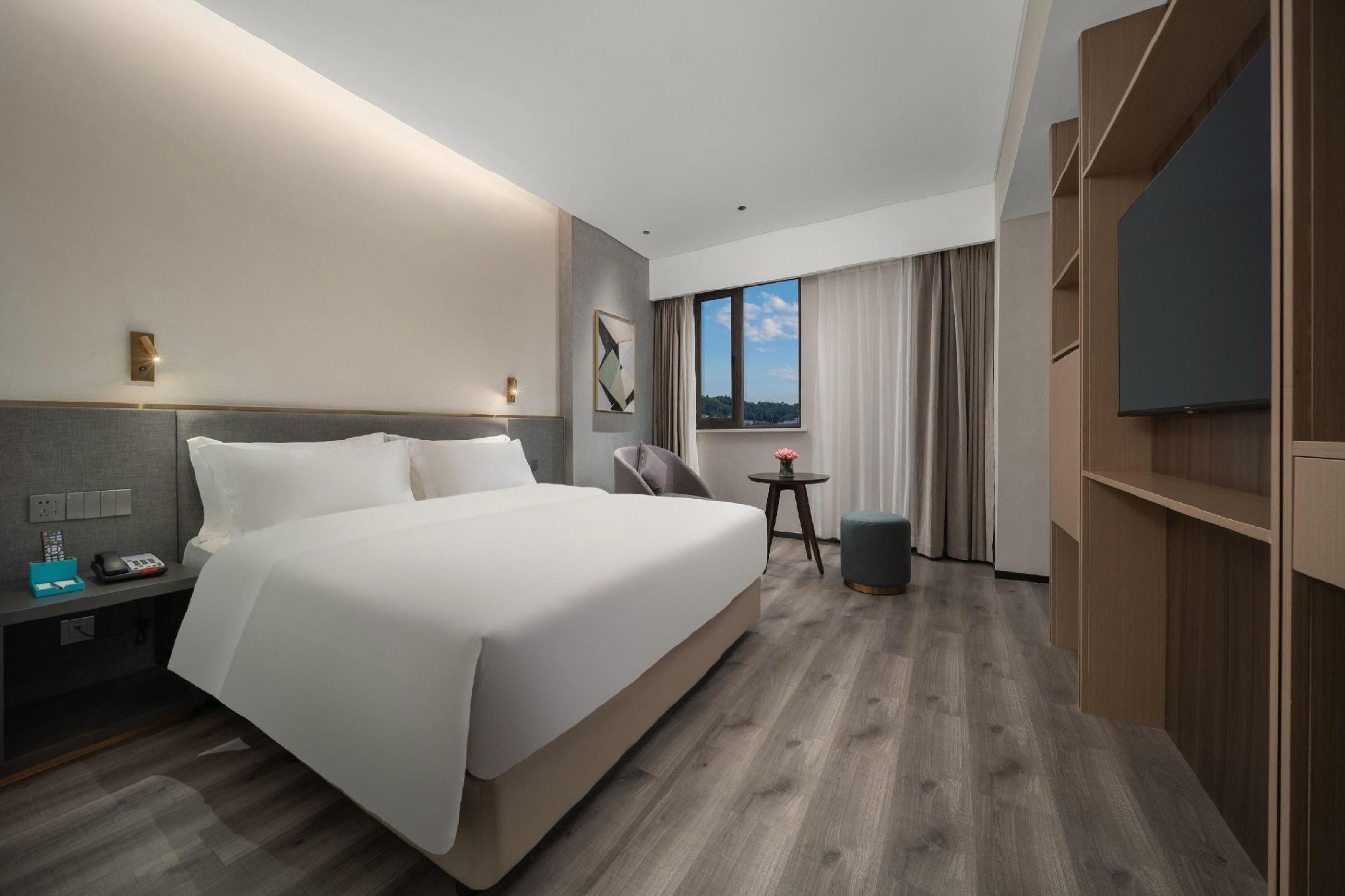 Kaiyuan Yiju Hotel (Xinchang Dafosi store) 19/47