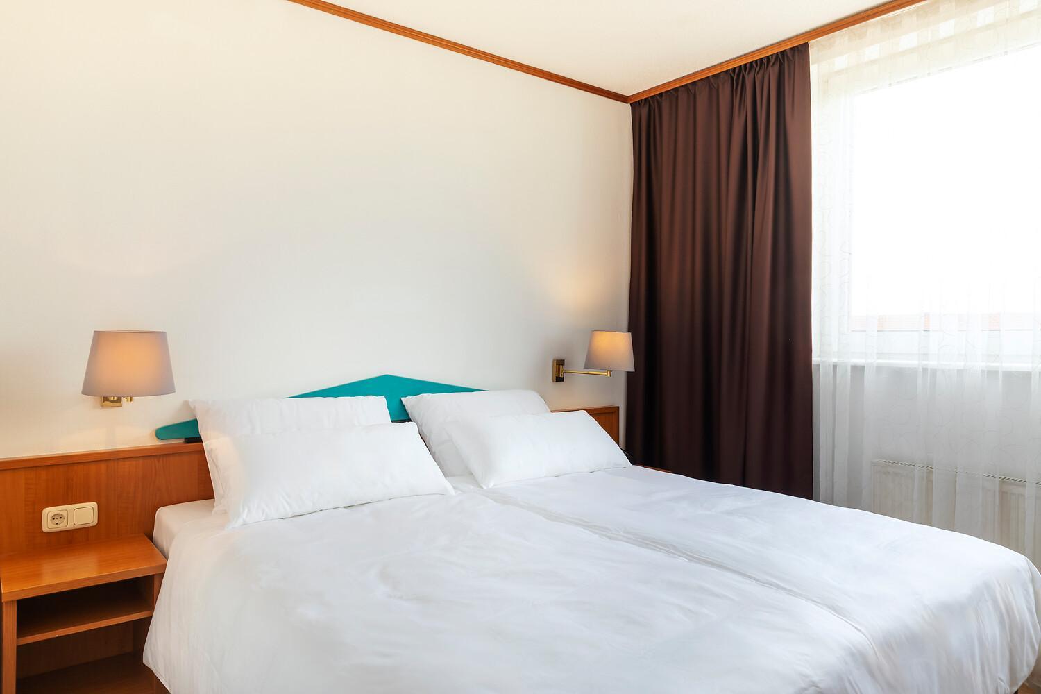 غرفة اقتصادية بسرير كوين، ACHAT Hotel Frankfurt Maintal 2/6