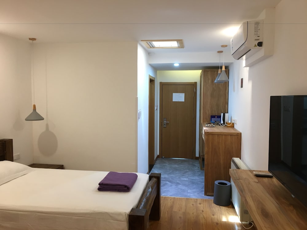 غرفة ديلوكس بسريرين منفصلين، Beijing Downtown Travelotel 4/5
