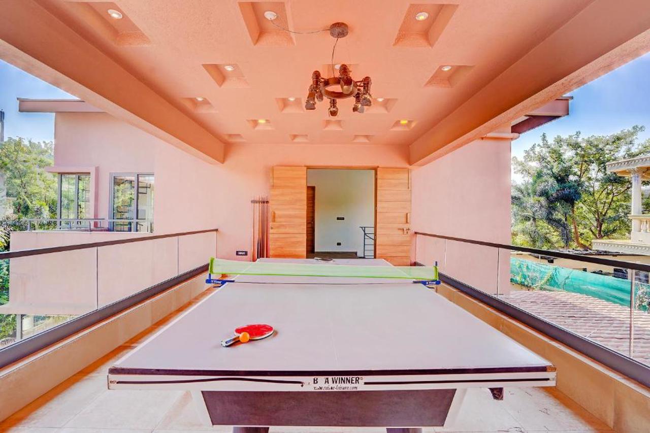 ELIVAAS Villa 39 Serene 6 BHK Retreat with Pvt Pool, Gaming Zone & Balcony 11/23