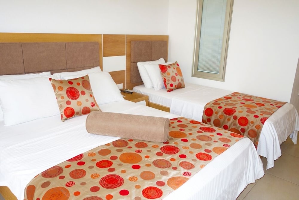 Deluxe, Triple, 1 Single and 2 Double Beds