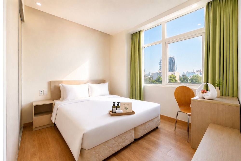 شقة ديلوكس بسرير كوين بإطلالة على المدينة بغرفة نوم واحدة، G8 Center Hotel Saigon 5/8