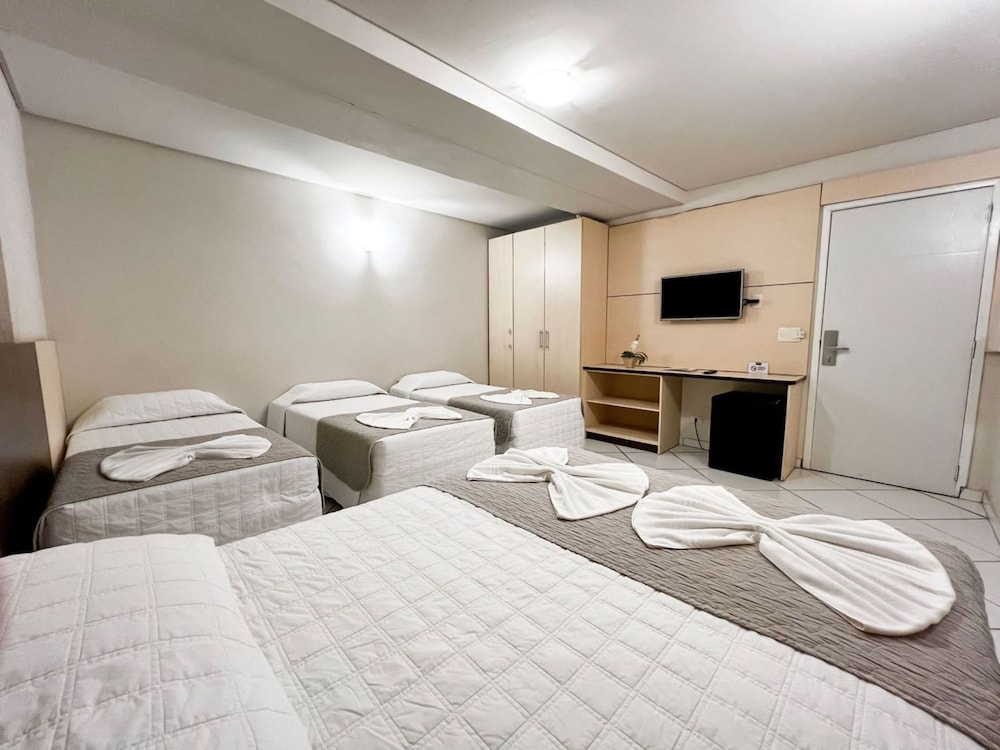 Deluxe, 1 Double and 3 Single Beds