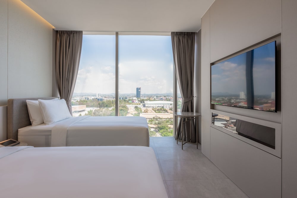 غرفة ديلوكس بسريرين منفصلين بإطلالة على البحر، Akara Hotel Pattaya 2/6