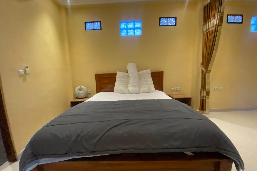 Capital O 93844 Arta Adi Homestay NearBali Zoo 19/24