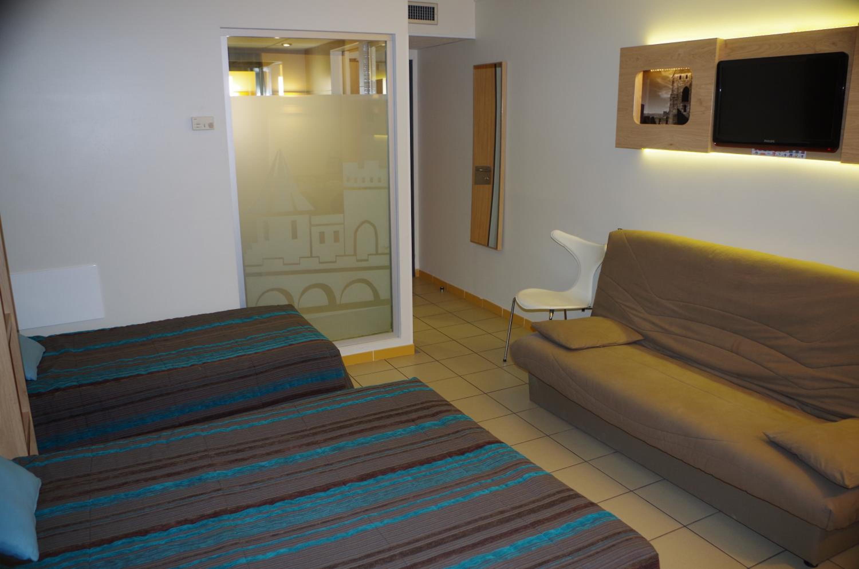 غرفة ديلوكس بسرير كينج، INTERHOTEL ESPACE CITE 6/8