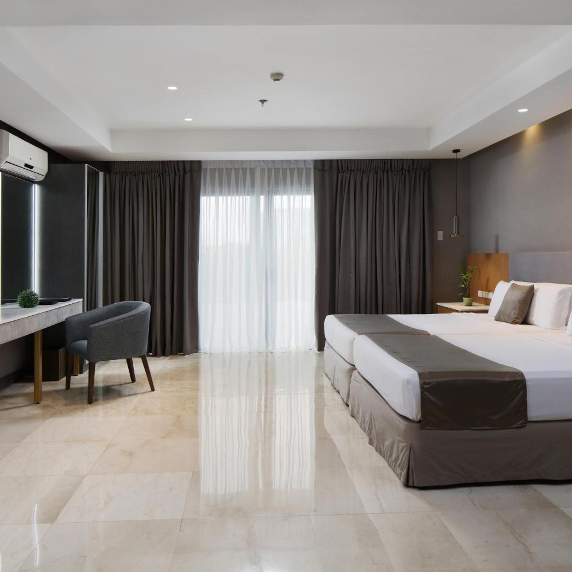 Penthouse Suite, Twin Beds, Balcony، City Garden Suites Manila 3/5