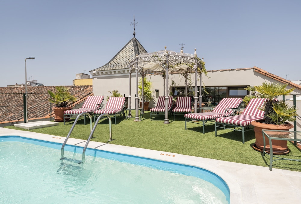 Ilunion Merida Palace Hotel 64/66