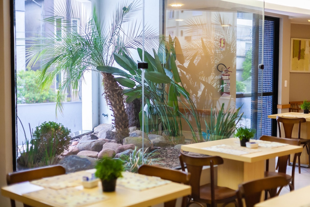 Tri Hotel & Flat Caxias 65/70