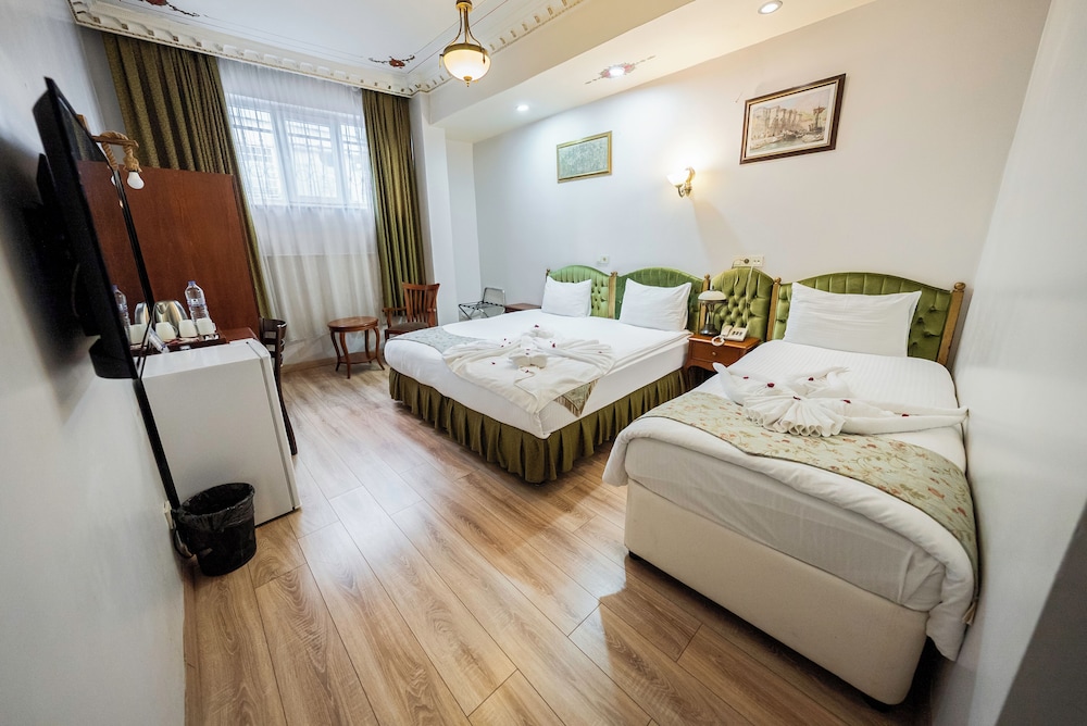 Economy, Triple, 1 Double and 1 Single Bed