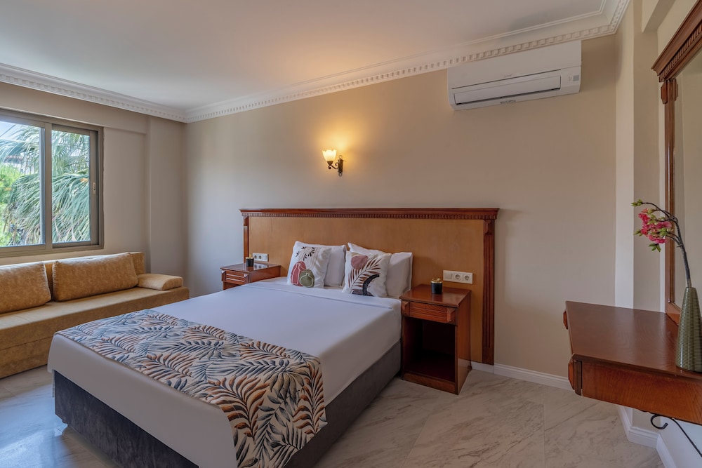 شقة عائلية بسرير فردي بإطلالة على الحديقة بغرفة نوم واحدة مع أريكة، Rosy Suites Hotel 3/9