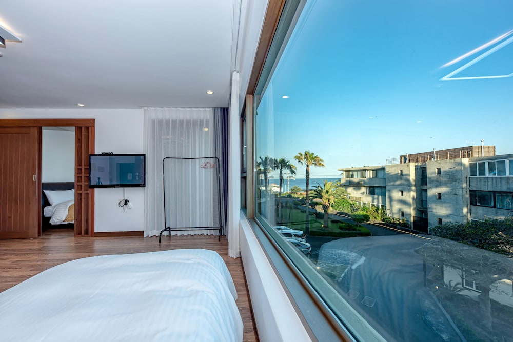 غرفة قياسية بسرير مزدوج وسرير فردي، T Island Resort 5/9