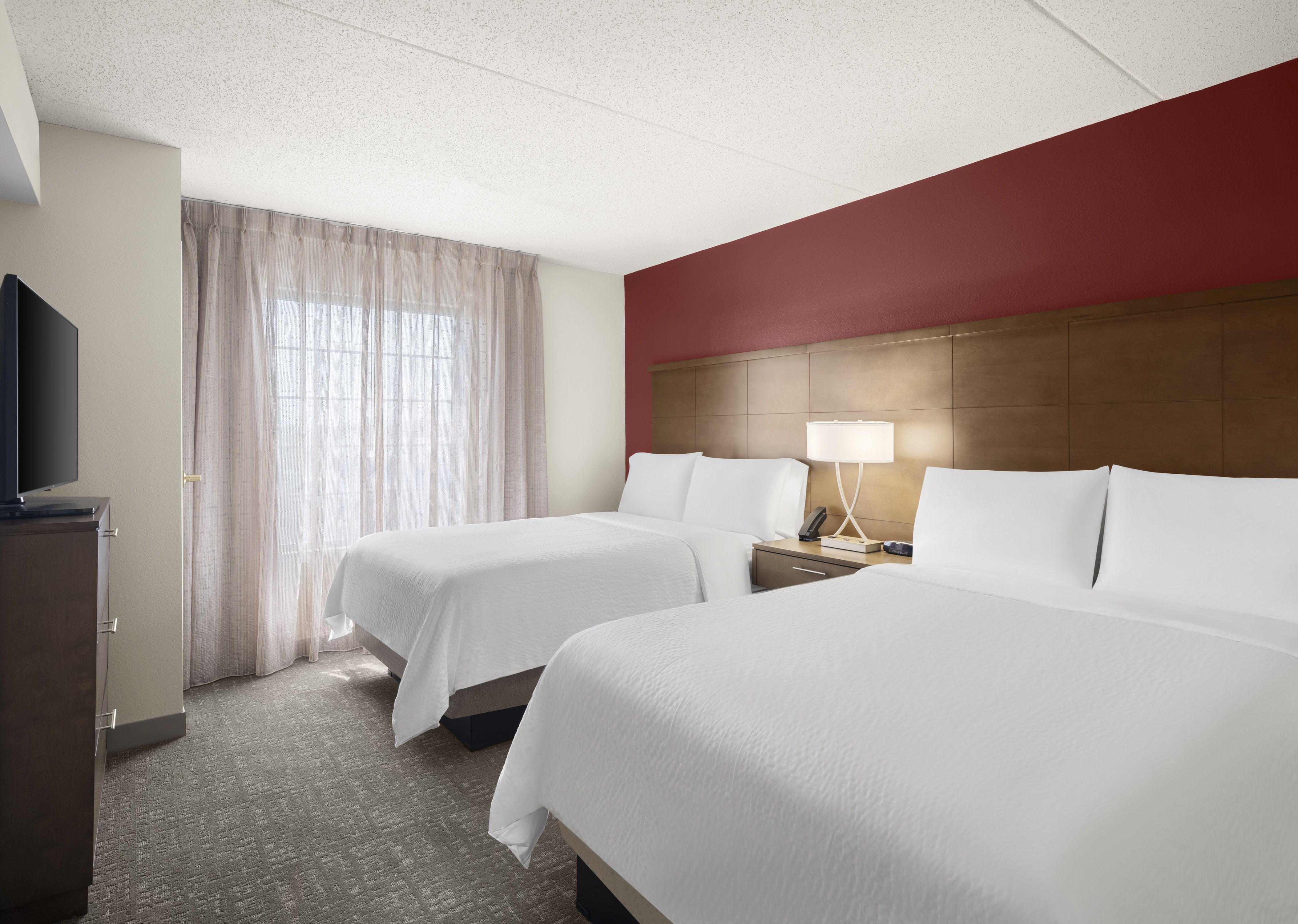 جناح بسريرين مزدوجين بغرفة نوم واحدة