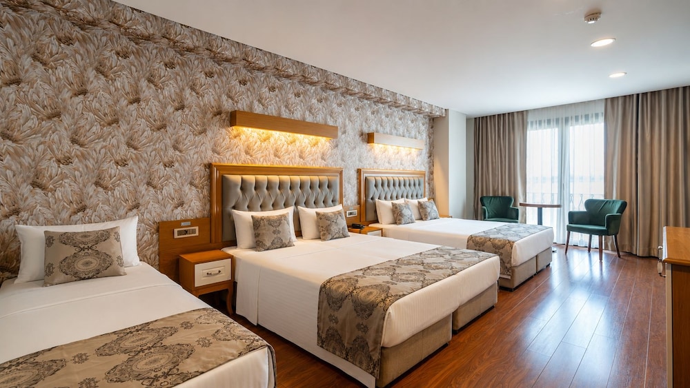 غرفة عائلية بسريرين منفصلين مع أريكة، Eliza Hotel 6/10