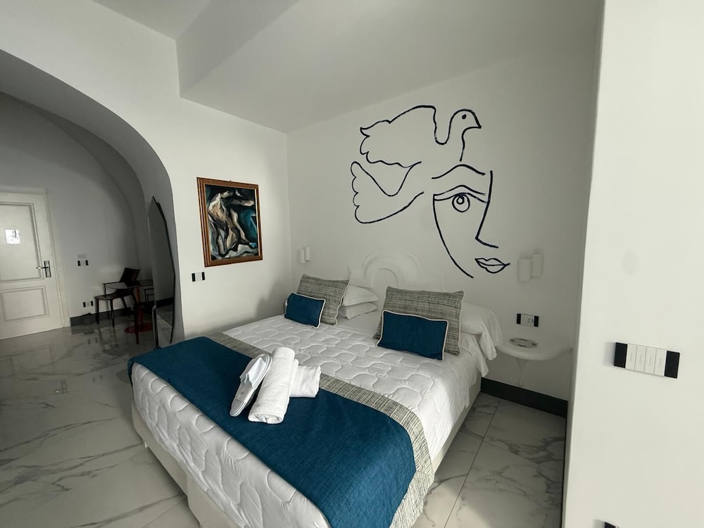 غرفة جونيور بسرير مزدوج وسريرين منفصلين، Positano Art Hotel Pasitea 4/10