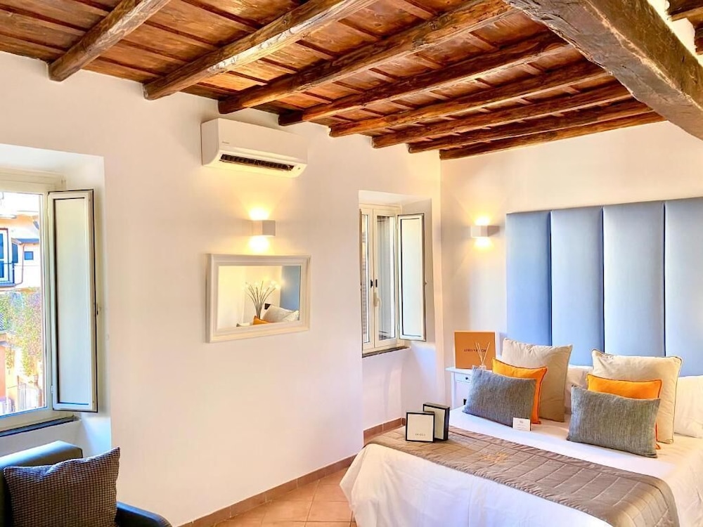 Relais Fontana di Trevi 46/64