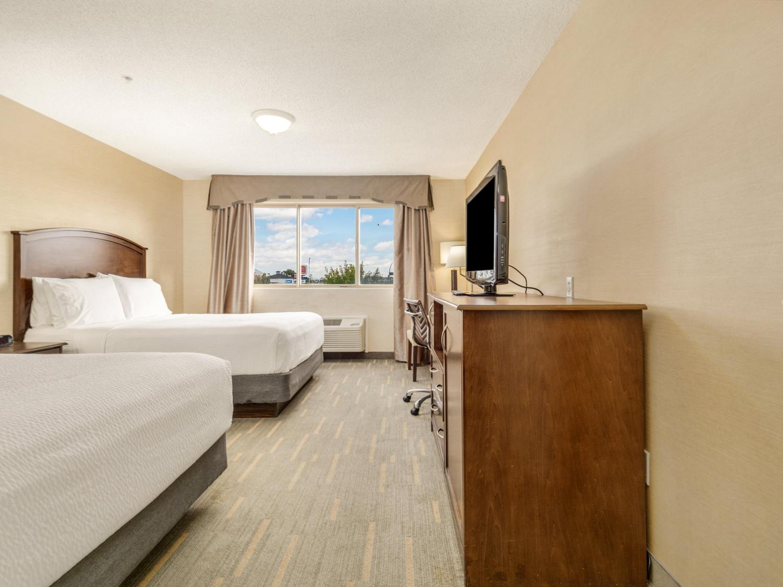 غرفة تنفيذية بسريرين كوين بغرفة نوم واحدة، HOLIDAY INN LETHBRIDGE 3/6