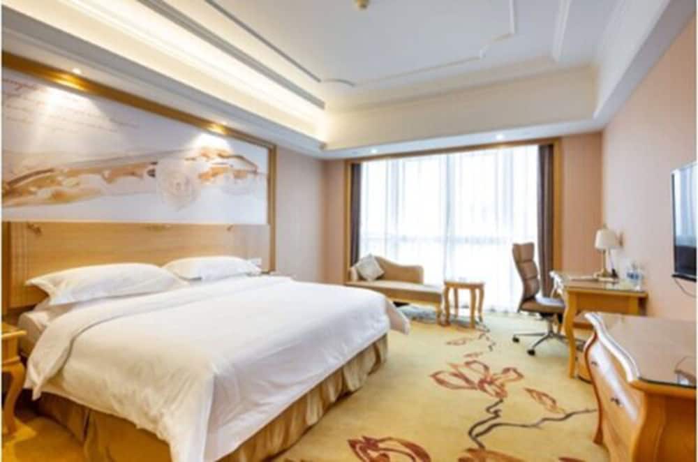 Vienna International Ningbo West Town Xintiandi 14/34