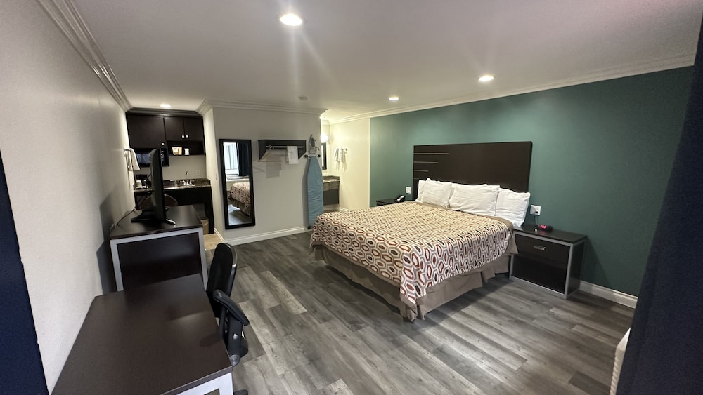 Garden Inn Suites 27/55