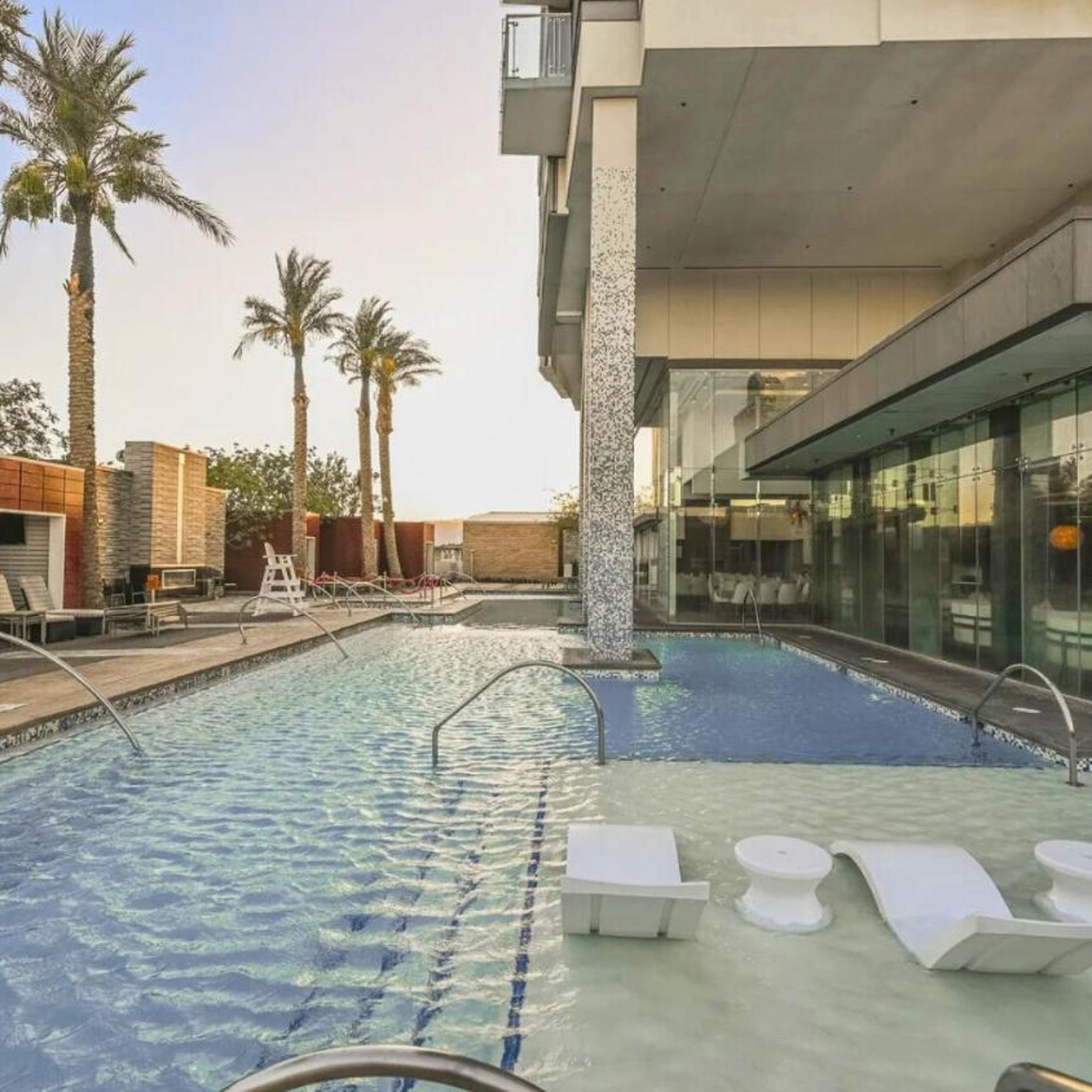 1 Bedroom Balcony Collection Living Room & Jet Tub Bath - StripSuite Palms Place Hotel 28/31