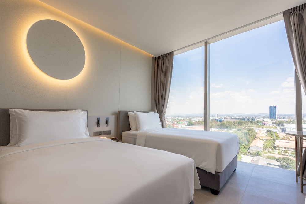غرفة ديلوكس بسريرين منفصلين بإطلالة على البحر، Akara Hotel Pattaya 3/6