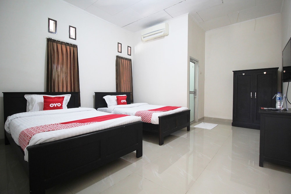 OYO 1547 Wisma Ray Syariah 13/31