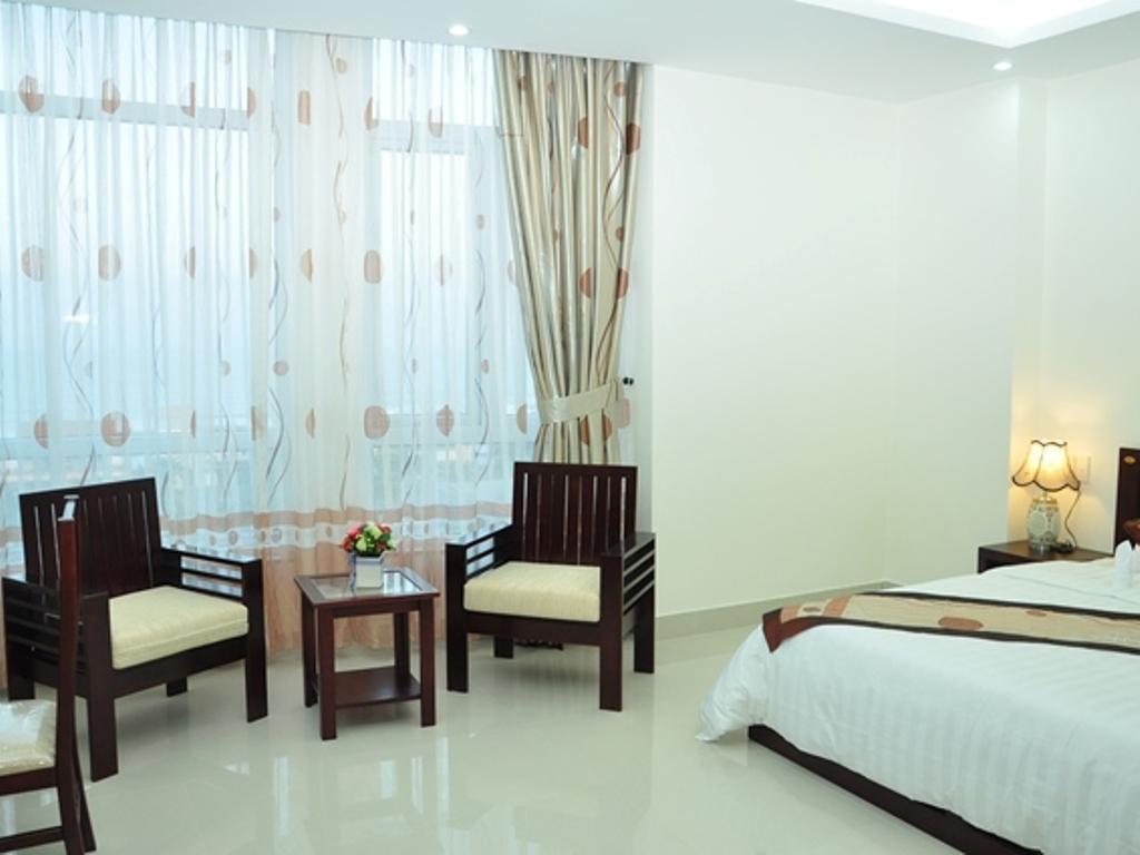 Deluxe, Triple, 1 Double and 1 Single Bed, Town View، Da Nang Port Hotel 3/3