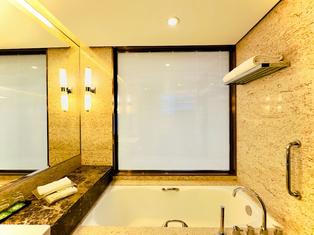 غرفة بريميوم بسرير كينج مع دخول صالة النادي في طابق مرتفع للمدخنين، Holiday Inn Nantong Oasis International 7/7