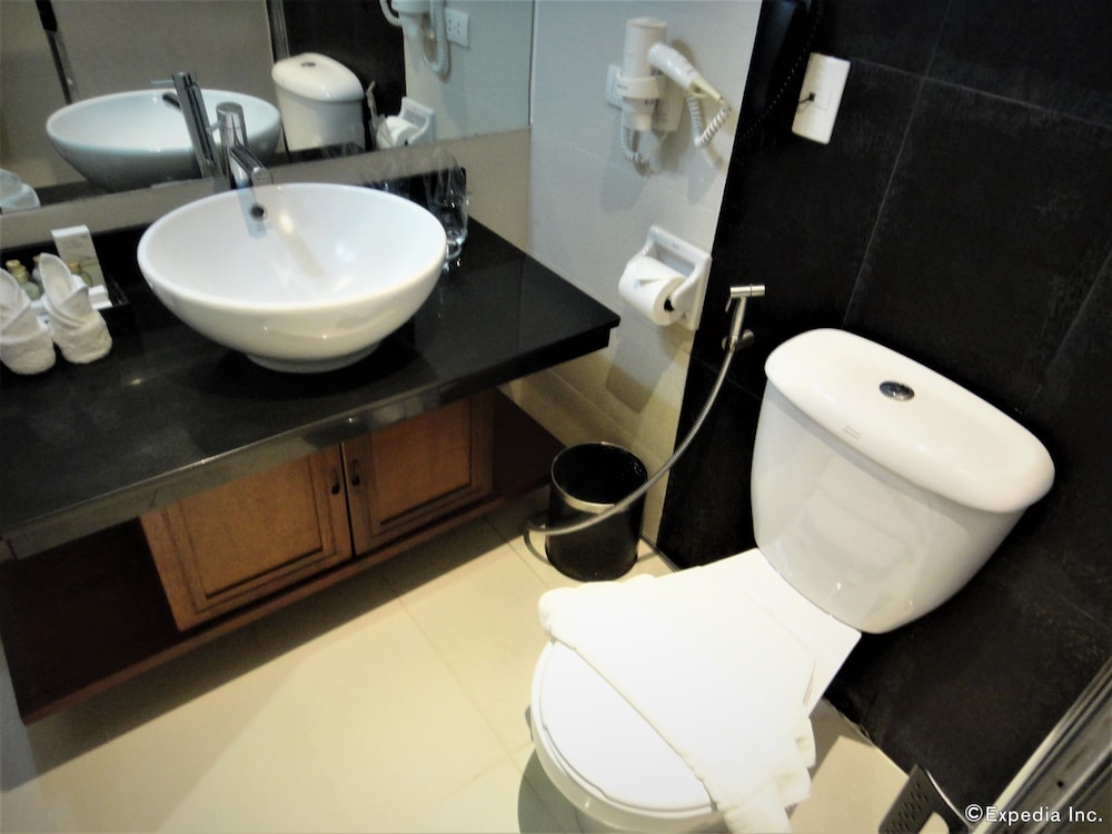 Hotel Centro Puerto Princesa Near Airport by ZUZU 106/107