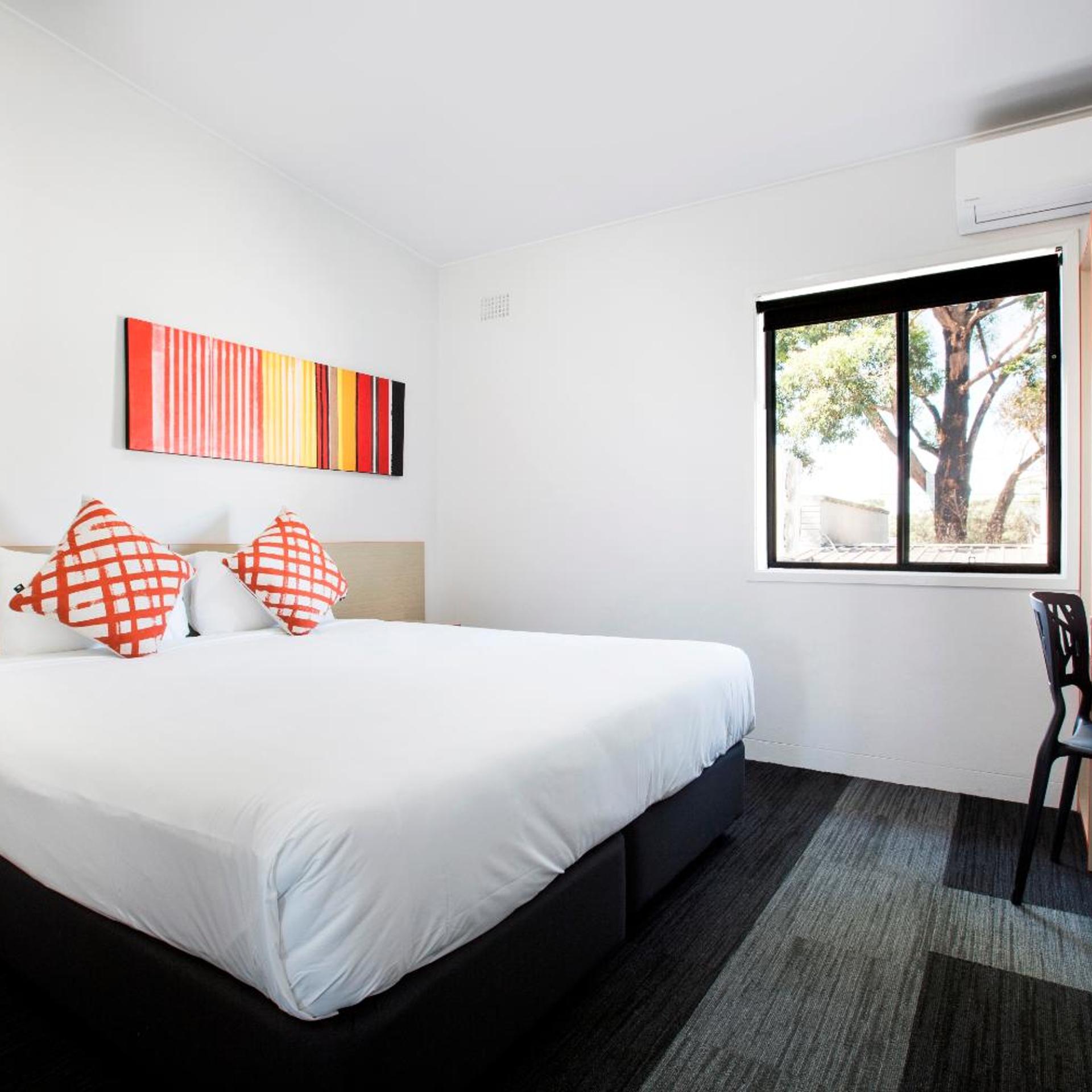 Compact, King Bed, Shared Bathroom