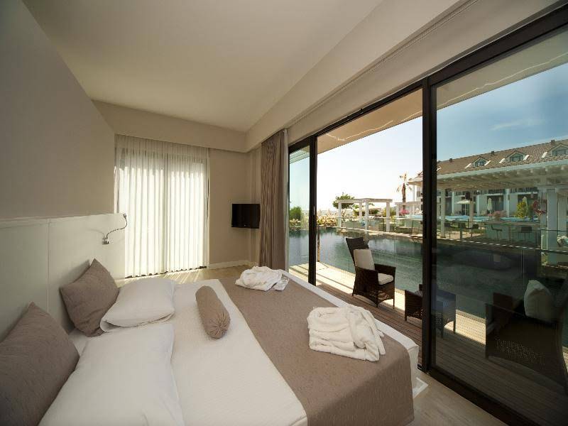 غرفة بسرير مزدوج بإطلالة على المسبح، Jiva Beach Resort 3/8