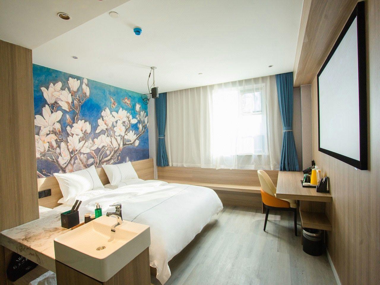 Magnolia Hotel (Yixing bus station store) 30/64