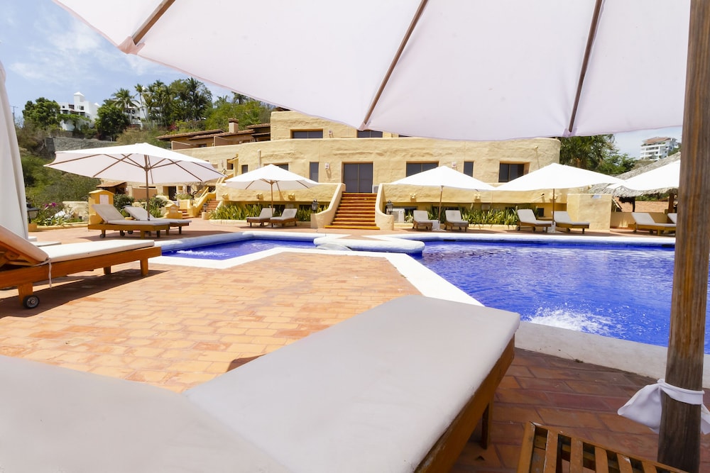 Hotel Plaza Tucanes 32/50