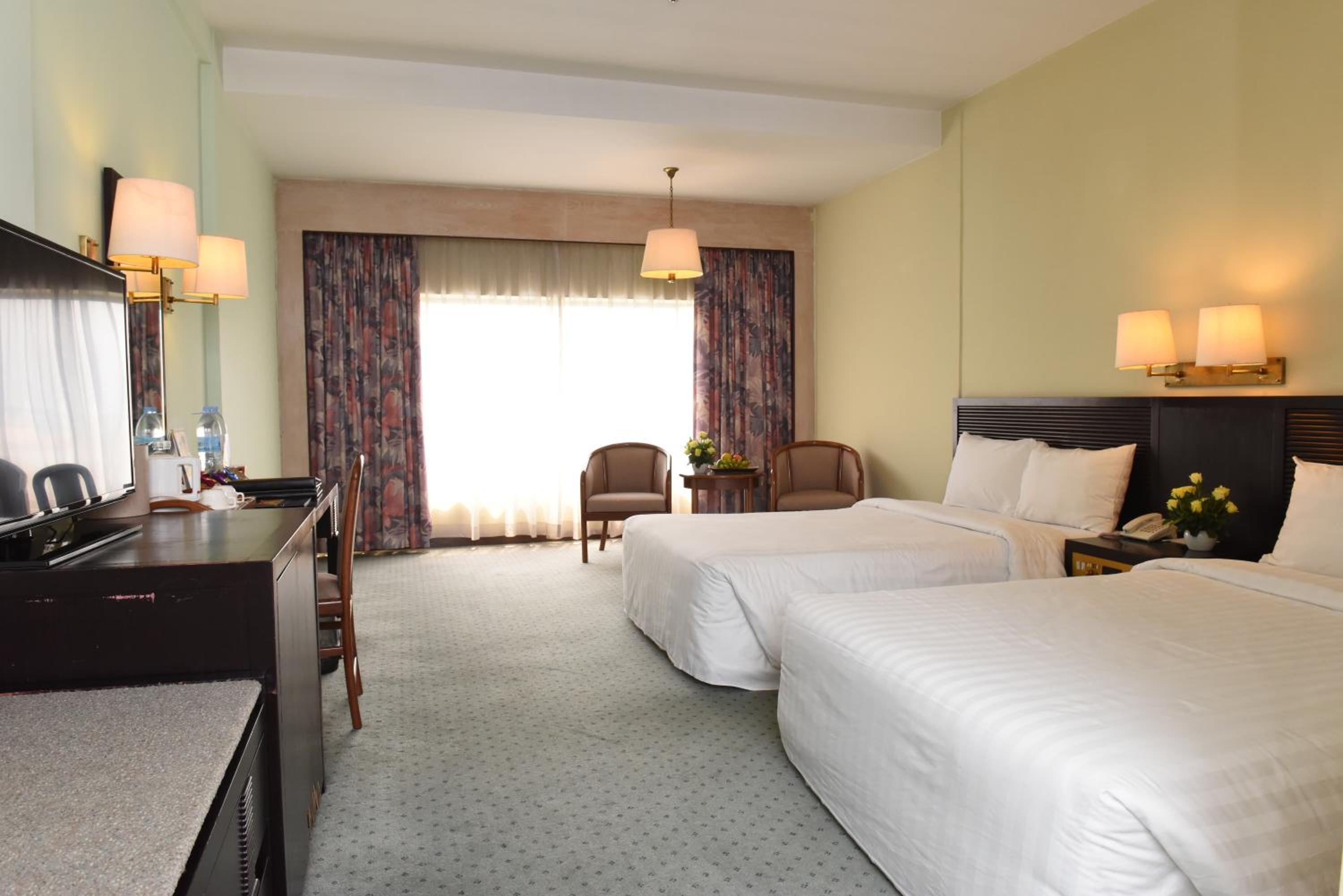 غرفة ديلوكس بسرير مزدوج أو سريرين منفصلين بإطلالة على المدينة، Cambodiana Hotel 8/10