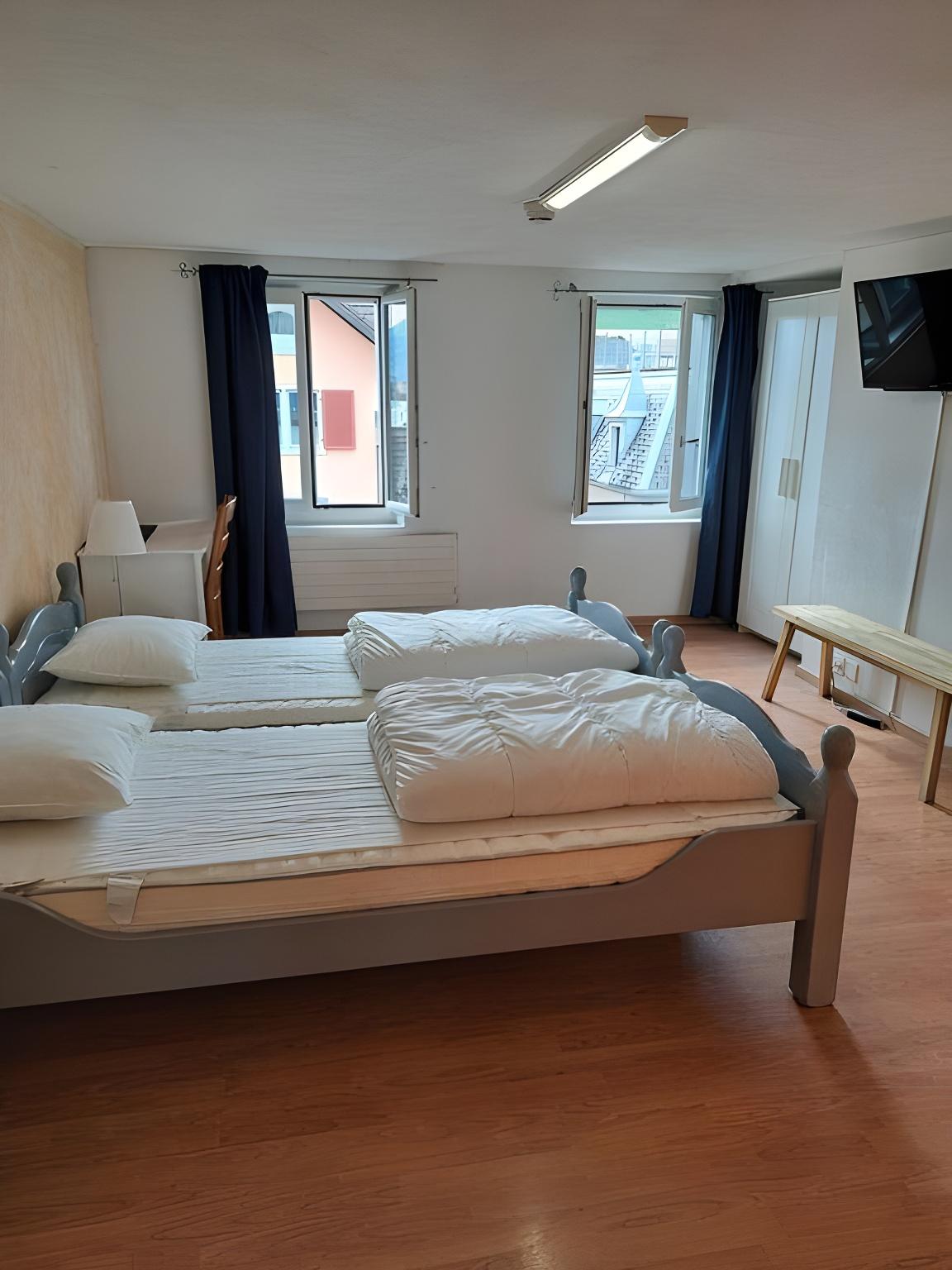 Economy, Single, 2 Double Beds, Shared Bathroom