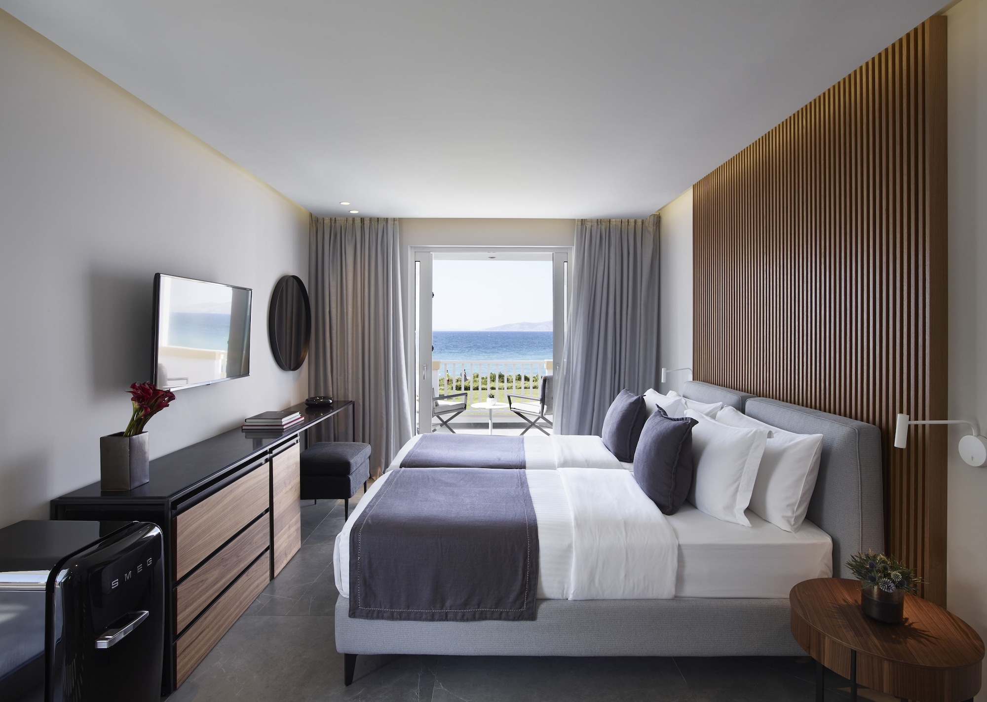 جناح رئاسي بسرير كينج وسريرين منفصلين بإطلالة على البحر