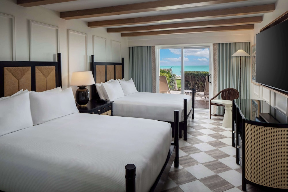 Suite, 2 Queen Beds, Pool and Partial Ocean View
