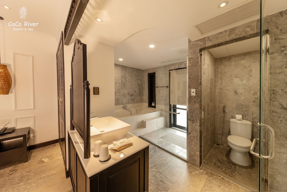 غرفة ديلوكس بسرير كينج بإطلالة على المسبح، Hoi An Coco River Resort Spa 9/9