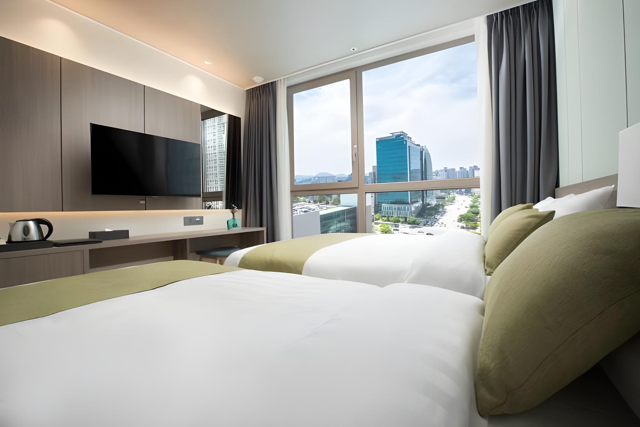 غرفة عائلية بسرير مزدوج وسرير فردي، Utop Boutique Hotel and Residence 3/3