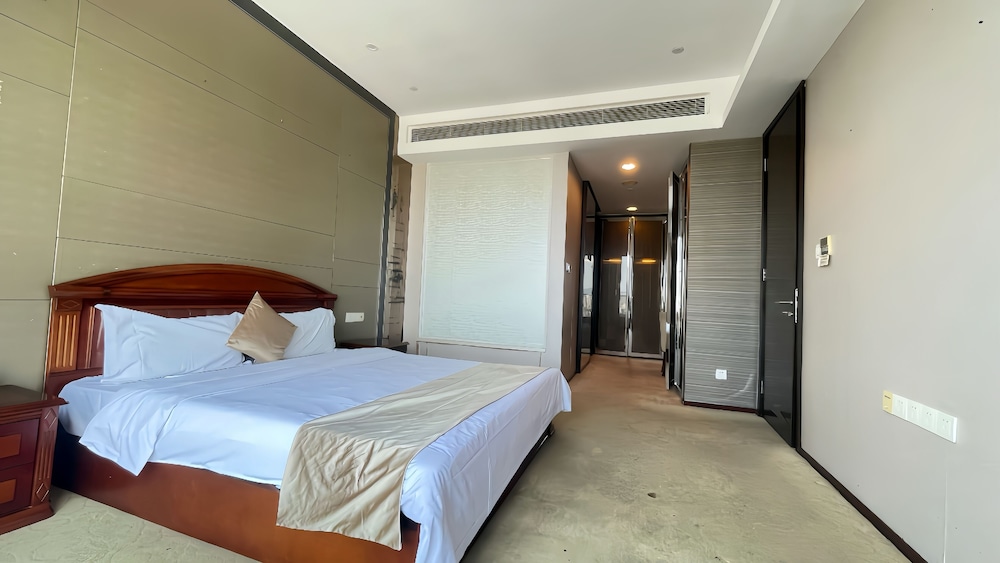 Xingyi International Hotel Poly Store 26/70