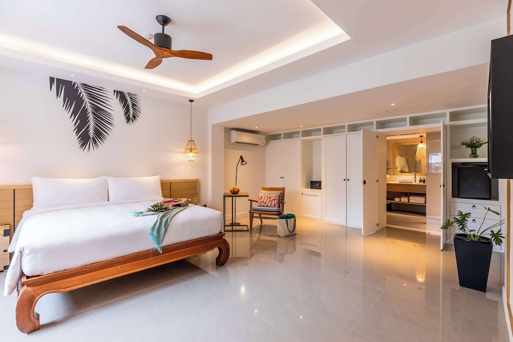 Outrigger Surin Beach Resort 24/74