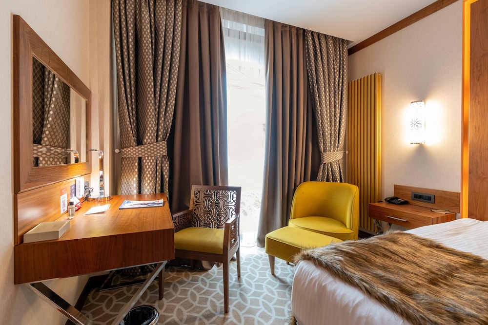 غرفة ديلوكس بسرير كوين، RAMADA RESORT ERCIYES 5/10