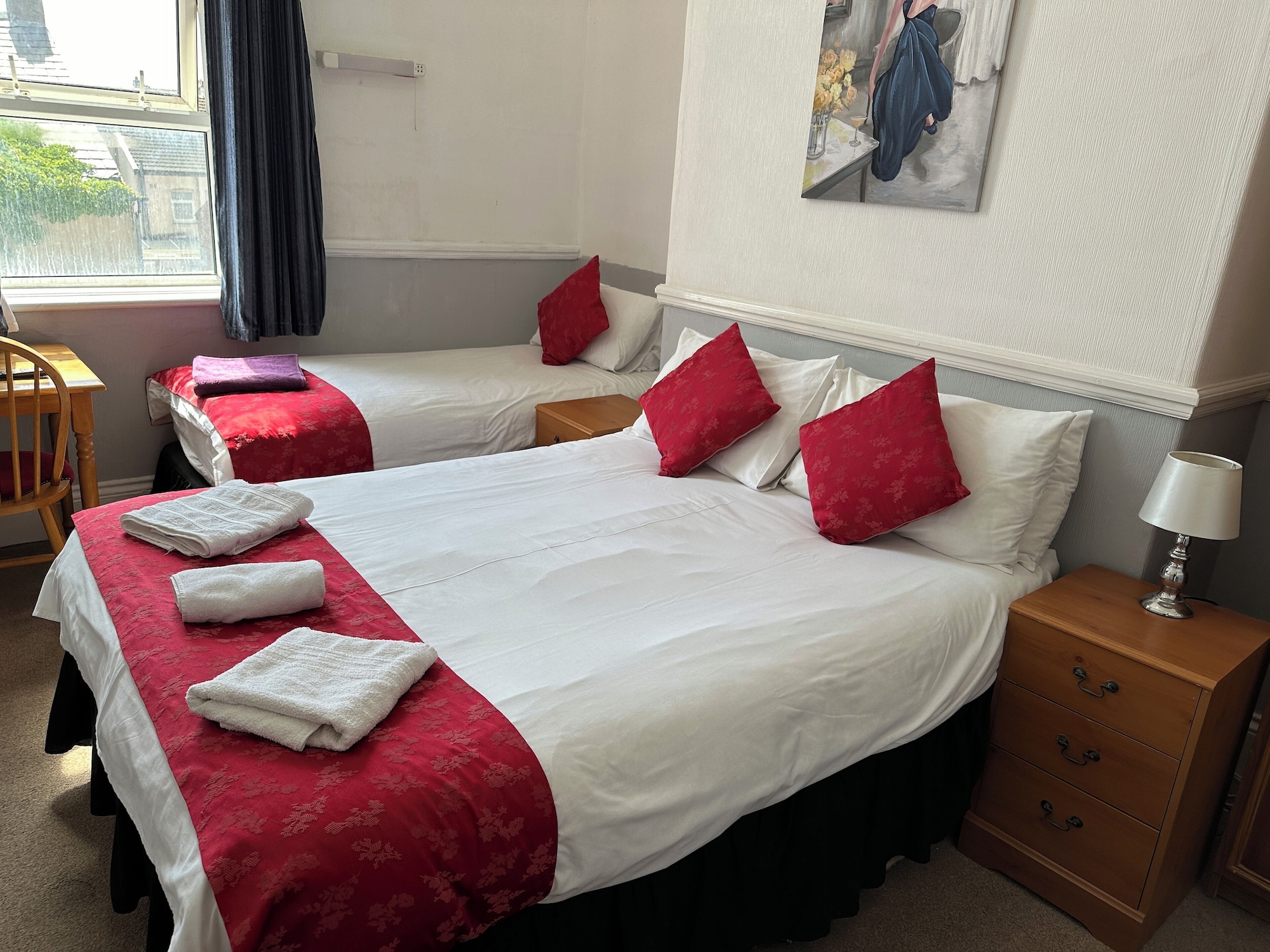 Basic, Triple, 1 Double and 1 Single Bed