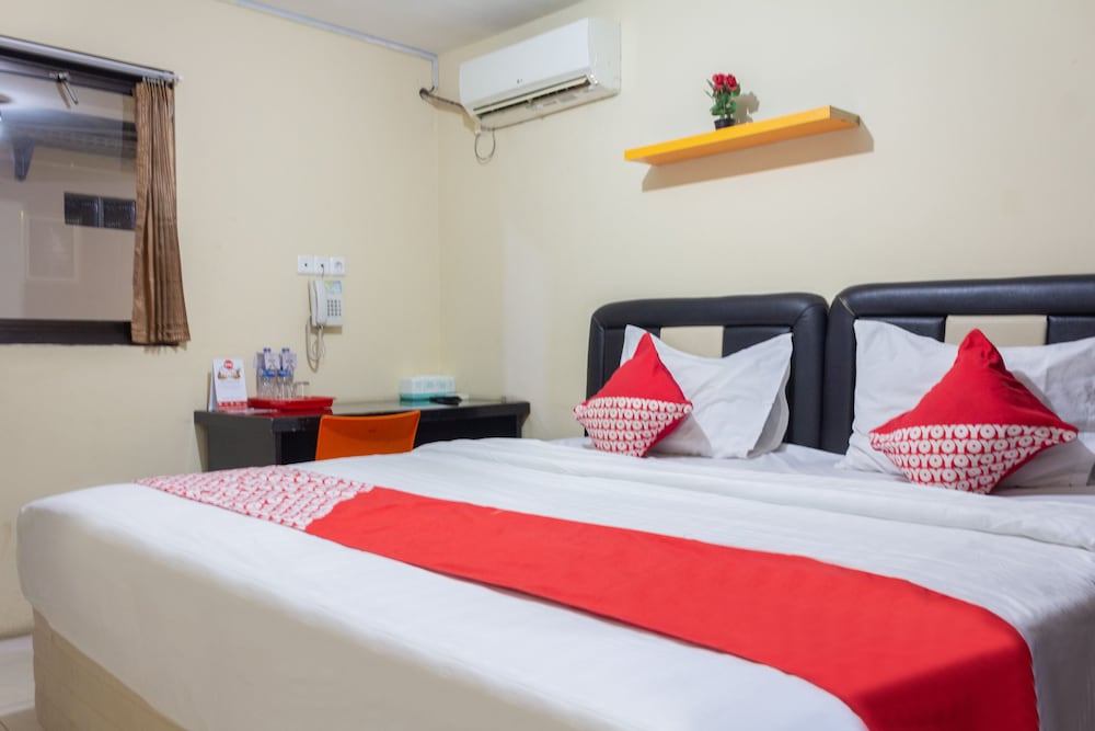 Oyo 989 Audah Guesthouse Syariah 6/36