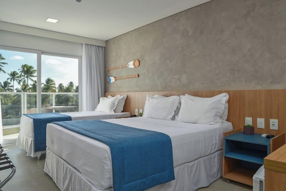 Suite, 1 Queen and 1 Single Bed, Side Sea View
