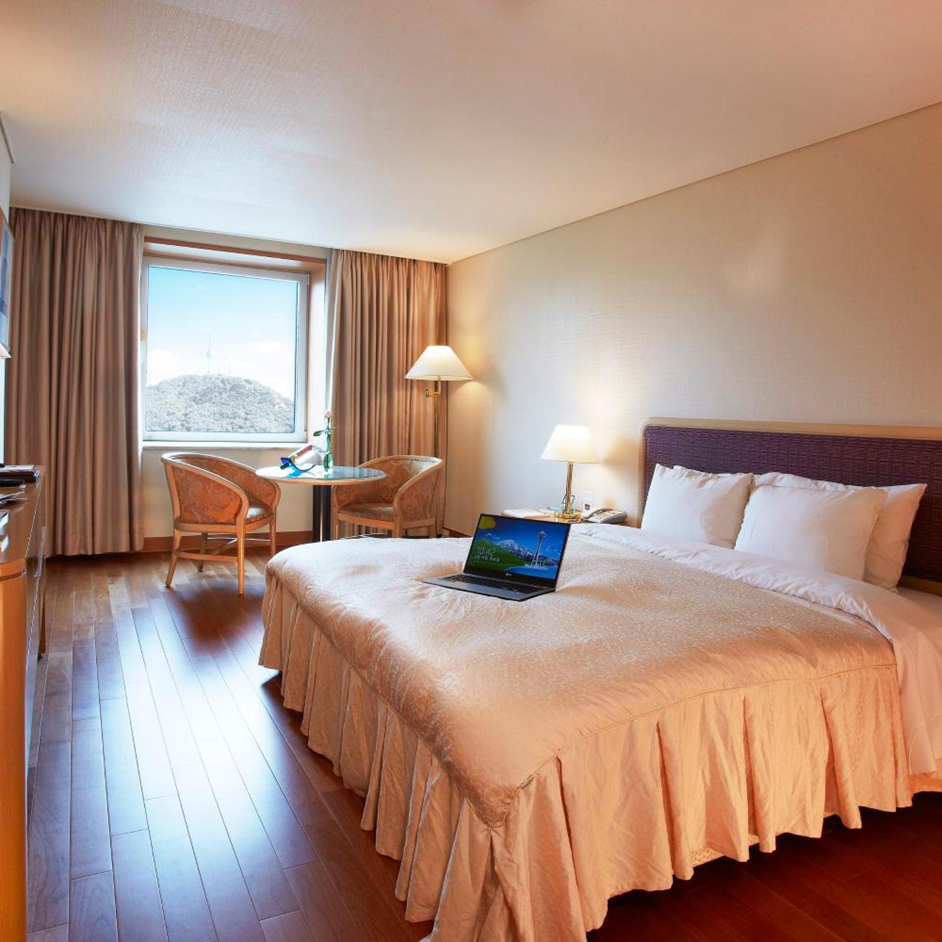 غرفة ديلوكس بسرير مزدوج بحوض استحمام، Sejong Hotel 2/4