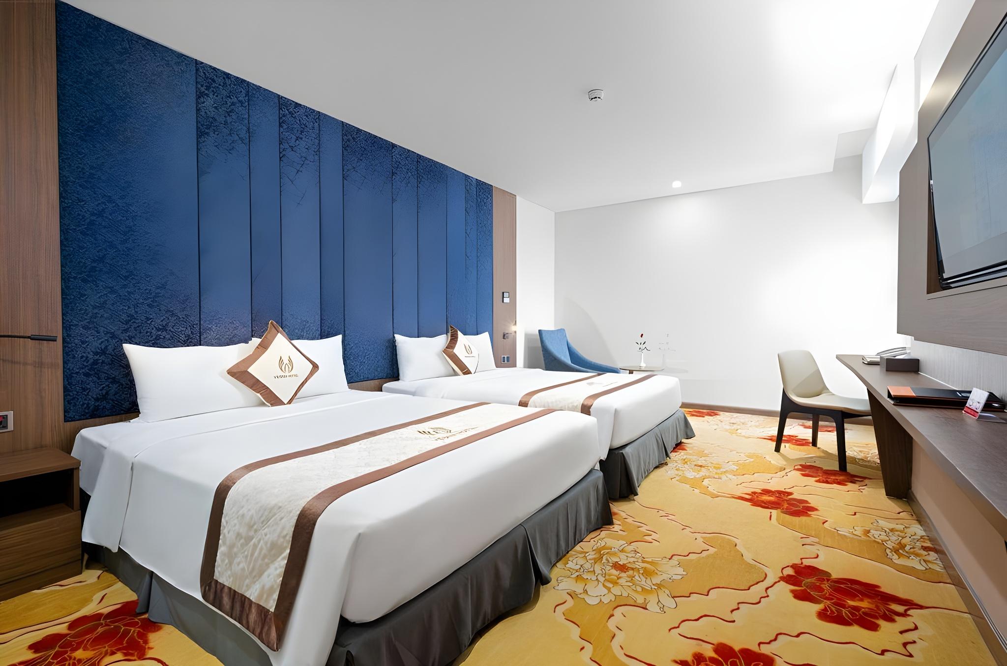Deluxe, Quadruple, 2 Queen Beds
