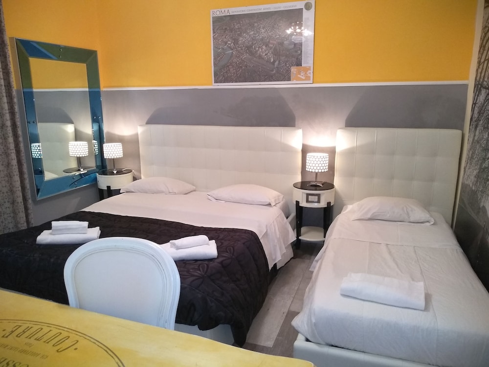 غرفة اقتصادية ثلاثية بسرير كوين وسرير فردي، Deluxe Rooms 3/3