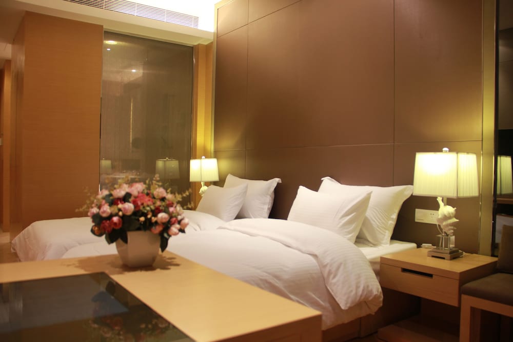 Xingyi International Hotel Poly Store 13/70