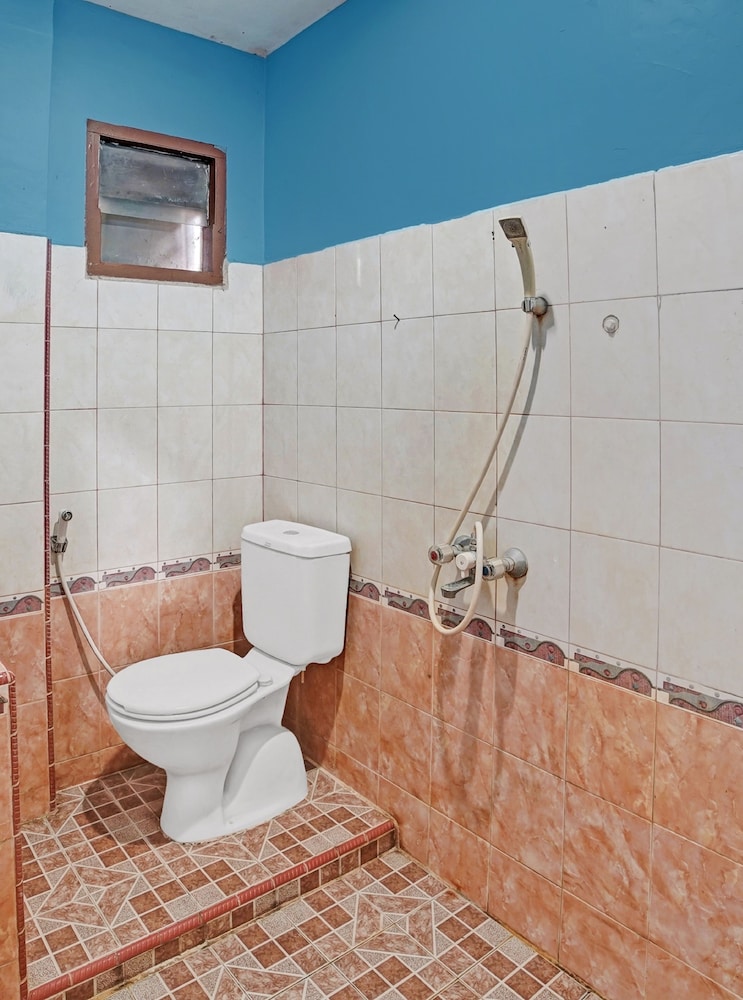 OYO 90487 Wisma Kuta Karang Baru 28/31